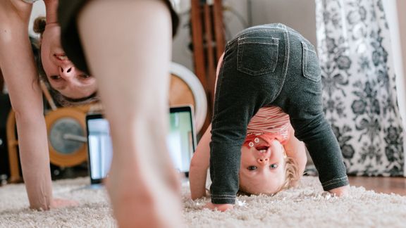 Pediatric age toddler doing yoga