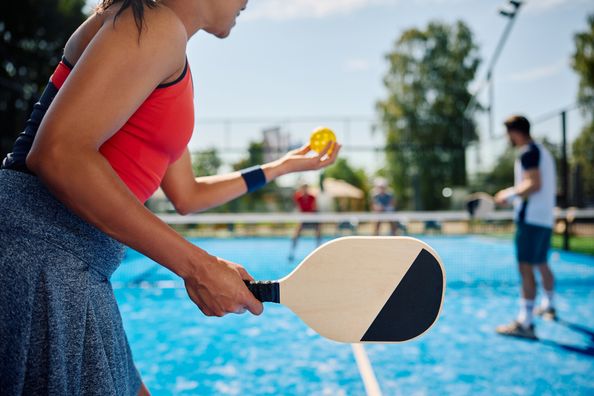 Woman playing pickleball