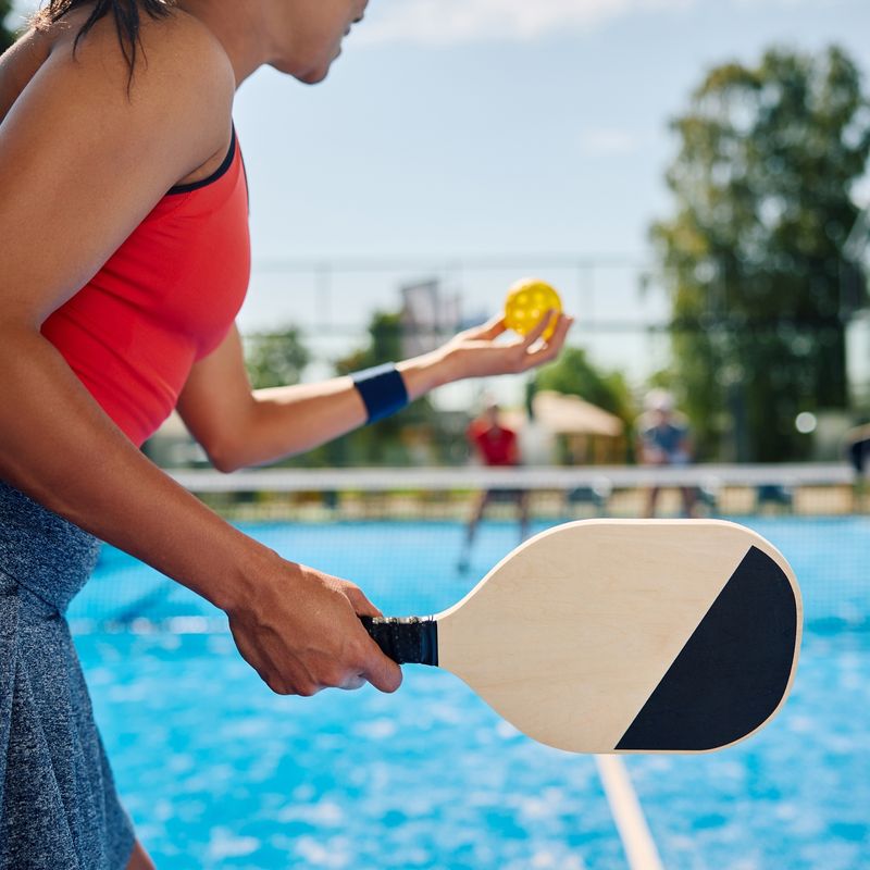 Woman playing pickleball